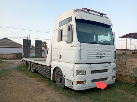 MAN  2003