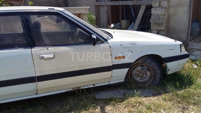 Nissan  1987, 200,000 km - 1.8 l - Bakı