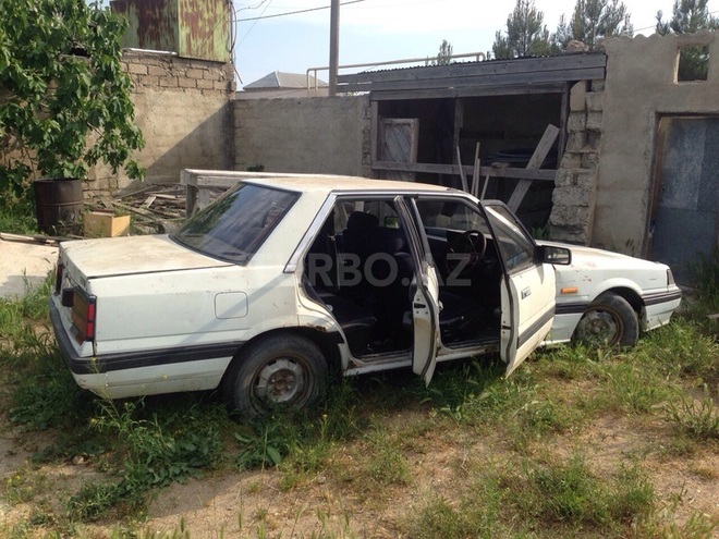 Nissan  1986, 100,000 km - 1.8 l - Bakı