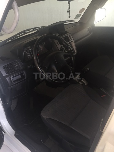 Mitsubishi Pajero io 2000, 200,000 km - 2.0 л - Bakı