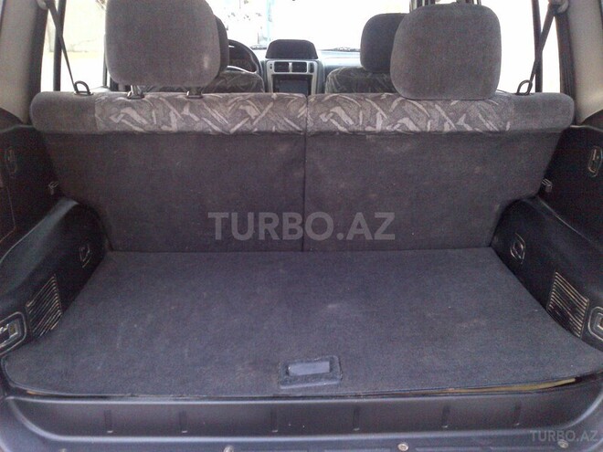 Mitsubishi Pajero io 1999, 240,000 km - 1.8 l - Bakı