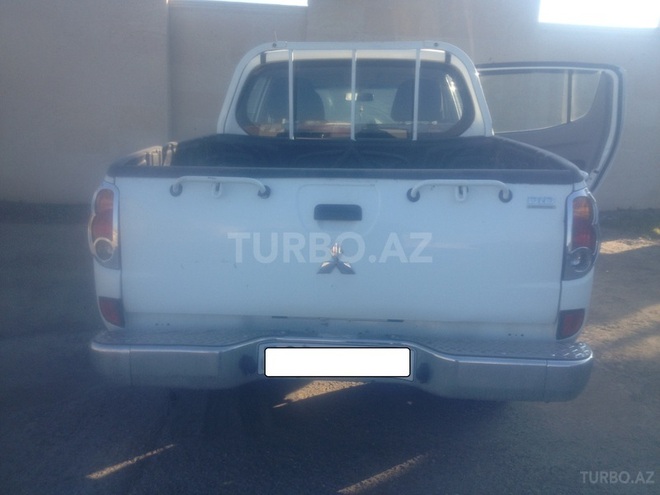 Mitsubishi L200 2009, 99,000 km - 2.5 л - Bakı