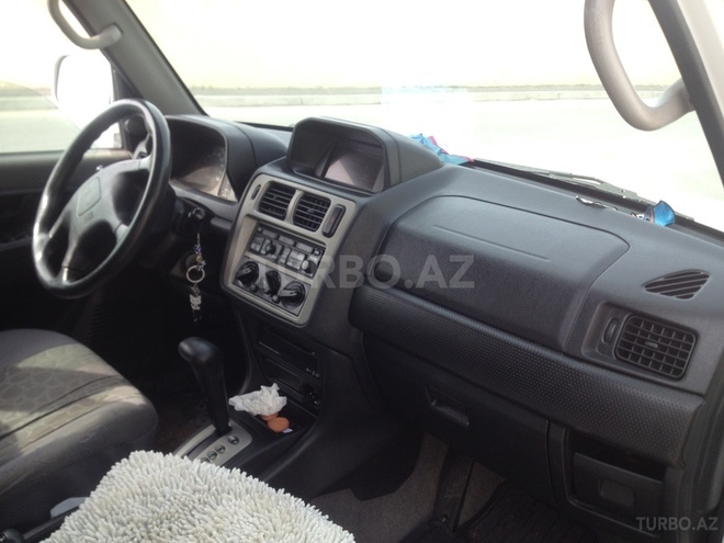 Mitsubishi Pajero io 1999, 142,000 km - 1.8 l - Bakı