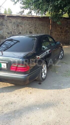 Mercedes E 230 1997, 354,444 km - 2.3 l - Bakı