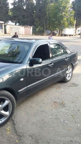 Mercedes E 230 1997, 354,444 km - 2.3 l - Bakı
