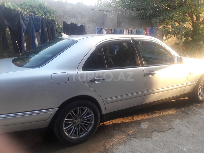 Mercedes E 230 1995, 402,824 km - 0.3 l - Bakı