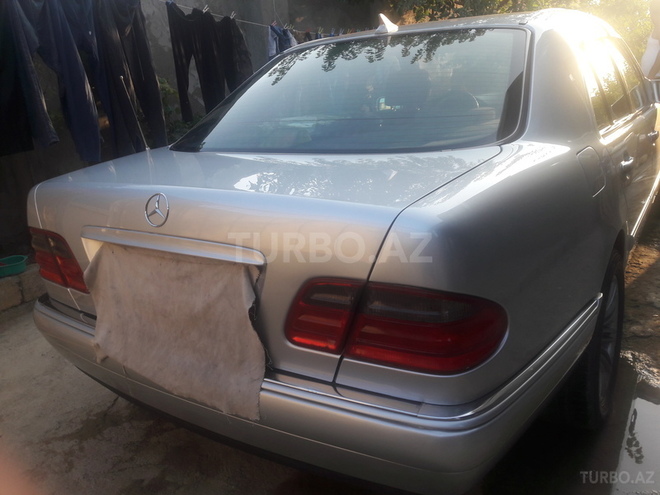 Mercedes E 230 1995, 402,824 km - 0.3 l - Bakı