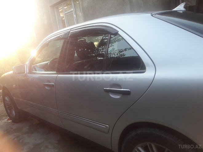Mercedes E 230 1995, 402,824 km - 0.3 l - Bakı