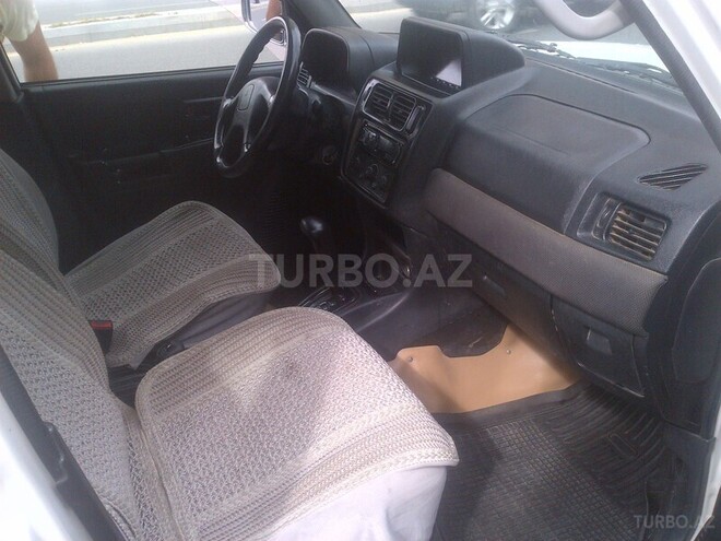 Mitsubishi Pajero io 2001, 176,000 km - 2.0 l - Bakı