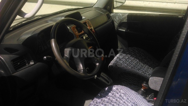 Mitsubishi Pajero io 1999, 186,000 km - 1.8 л - Bakı