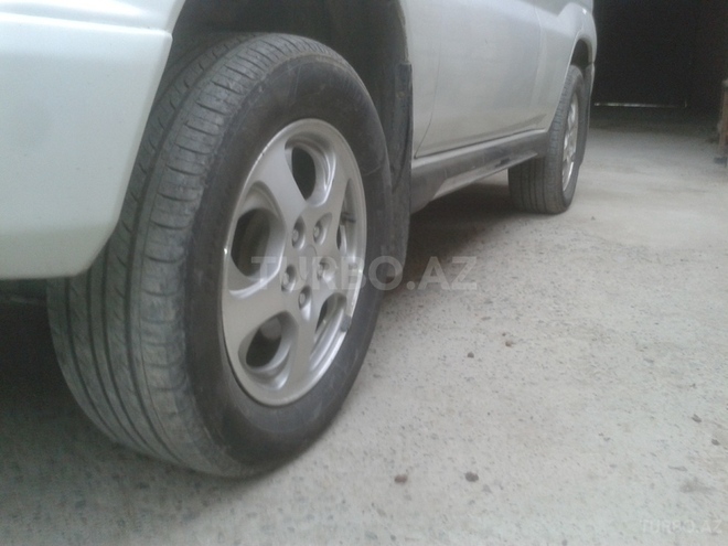 Mitsubishi Pajero io 1999, 130,000 km - 1.8 l - Bakı
