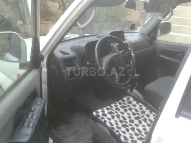 Mitsubishi Pajero io 1999, 130,000 km - 1.8 l - Bakı