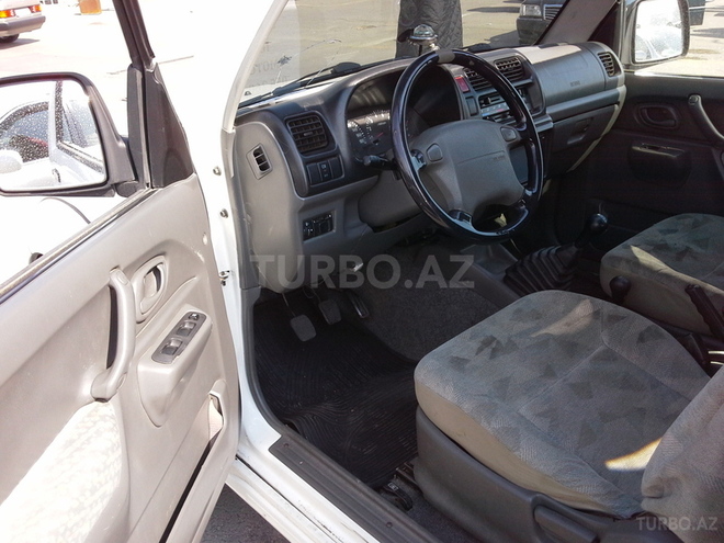 Suzuki  2004, 180,000 km - 1.3 l - Bakı