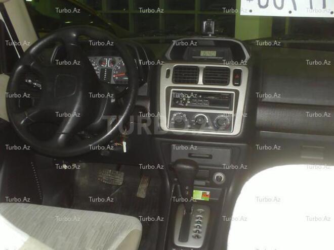 Mitsubishi Pajero io 2002, 111,300 km - 2.0 l - Bakı