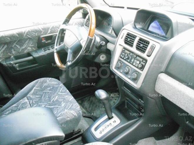 Mitsubishi Pajero io 1999, 120,000 km - 1.8 l - Bakı