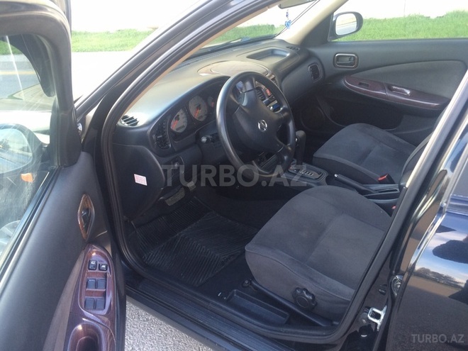 Nissan Sunny 2009, 82,000 km - 1.3 l - Bakı