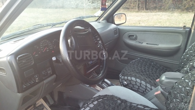 Kia Sportage 1998, 260,000 km - 2.0 l - Qax