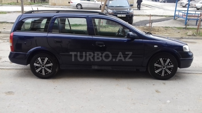 Opel Astra 2000, 205,653 km - 0.1 l - Quba