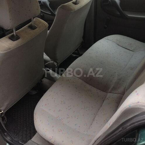 Volkswagen Polo 1998, 100,000 km - 1.8 l - Bakı