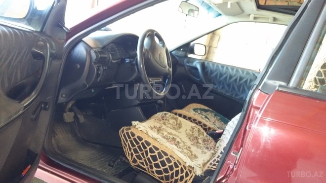 Opel Astra 1996, 250,000 km - 1.6 л - Xudat