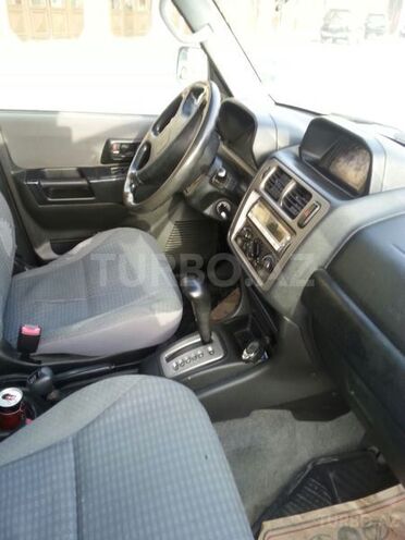 Mitsubishi Pajero io 1999, 250,000 km - 1.8 l - Bakı