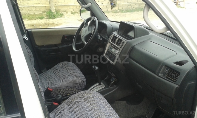 Mitsubishi Pajero io 2001, 174,000 km - 2.0 l - Bakı