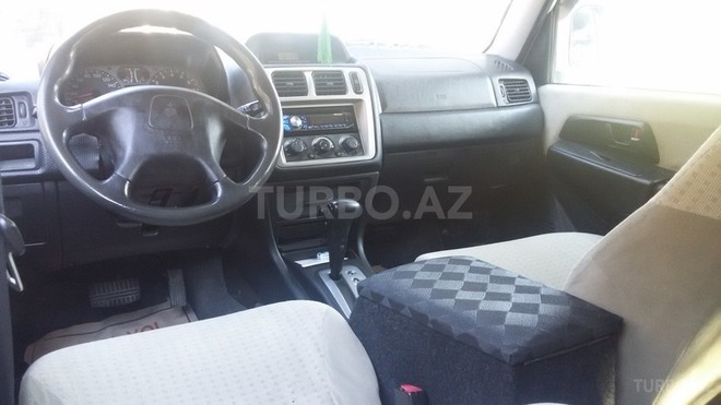 Mitsubishi Pajero io 2002, 213,123 km - 2.0 l - Bakı