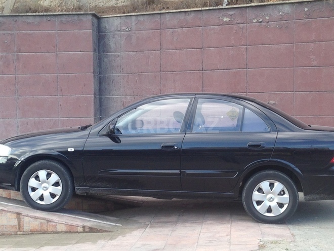Nissan Sunny 2012, 240,000 km - 1.6 l - Bakı