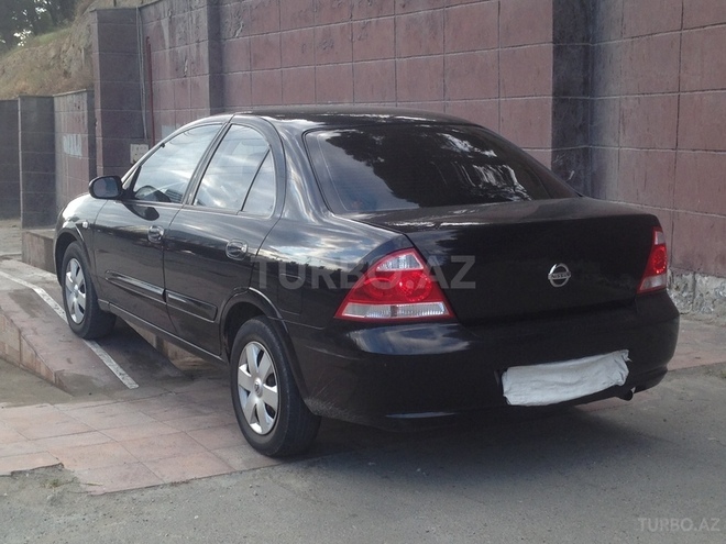 Nissan Sunny 2012, 240,000 km - 1.6 l - Bakı