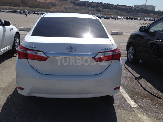 Toyota Corolla 2015, 1,400 km - 1.6 l - Bakı