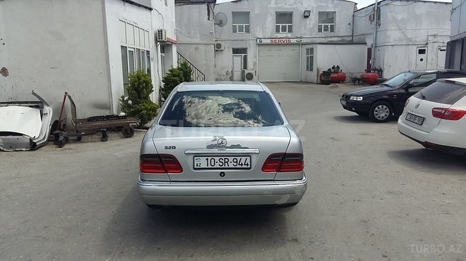 Mercedes E 230 1997, 348,555 km - 2.3 l - Bakı