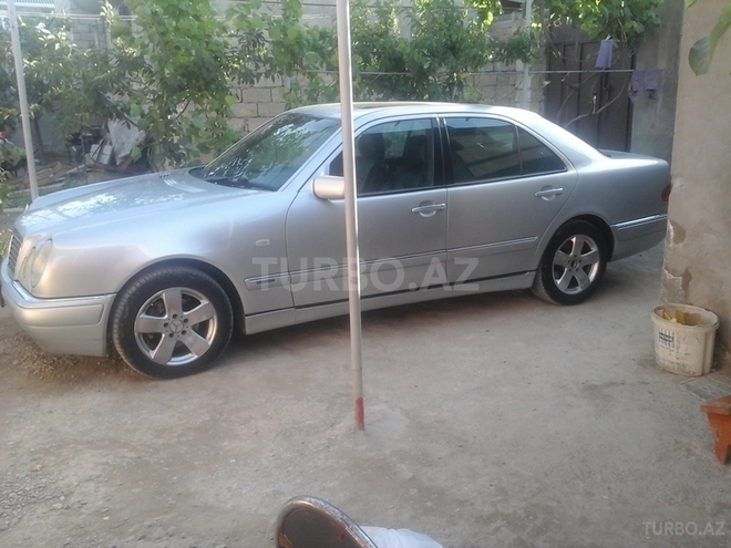 Mercedes E 230 1996, 266,298 km - 0.2 л - Bakı