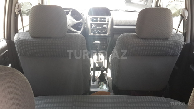 Mitsubishi Pajero io 1999, 126,600 km - 1.8 л - Bakı
