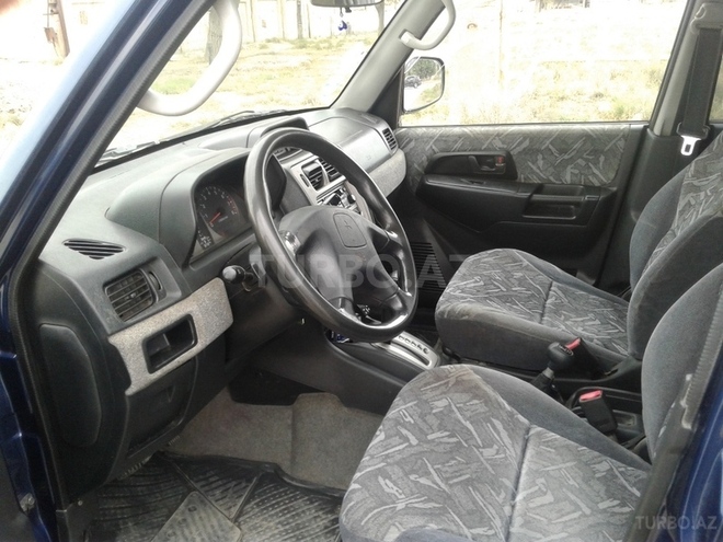 Mitsubishi Pajero io 1999, 120,500 km - 1.8 л - Sumqayıt