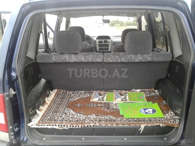 Mitsubishi Pajero io 1999, 120,500 km - 1.8 л - Sumqayıt