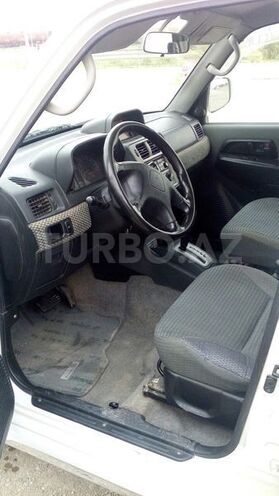 Mitsubishi Pajero io 1999, 150,000 km - 1.8 l - Sumqayıt