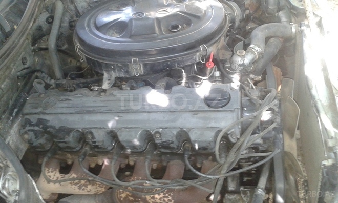 Mercedes E 260 1988, 414,392 km - 2.6 l - Bakı