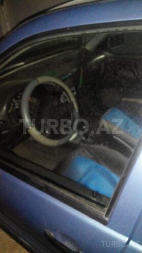 Volkswagen Polo 1997, 180,000 km - 1.4 l - Bakı
