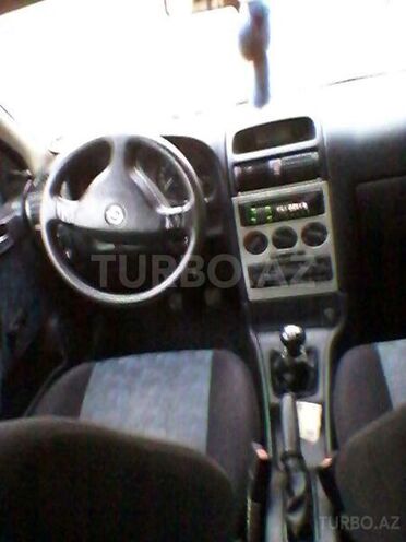 Opel Astra 1999, 250,012 km - 1.2 л - Şirvan