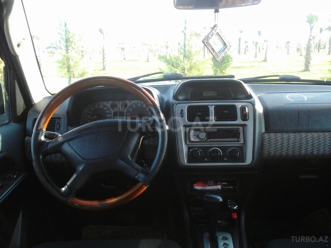 Mitsubishi Pajero io 2001, 295,000 km - 1.8 л - Sumqayıt