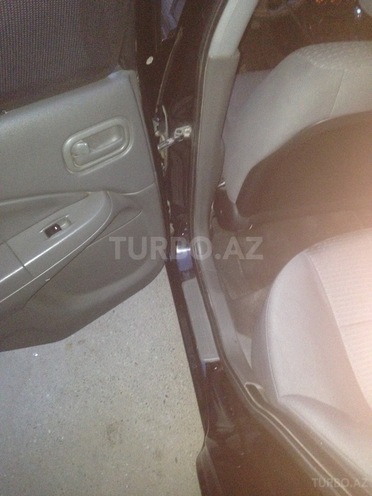Nissan Sunny 2011, 250,000 km - 1.6 l - Bakı