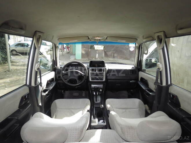 Mitsubishi Pajero io 2002, 190,000 km - 2.0 l - Bakı