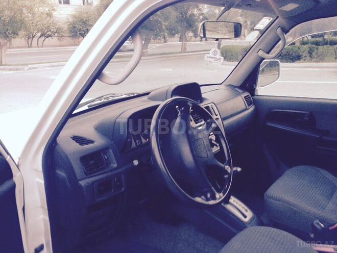 Mitsubishi Pajero io 1999, 215,000 km - 1.8 l - Bakı
