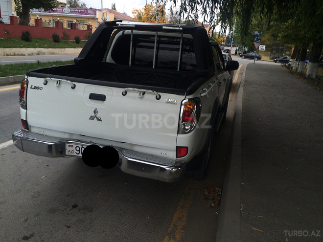 Mitsubishi L200 2007, 139,000 km - 0.3 л - Qusar