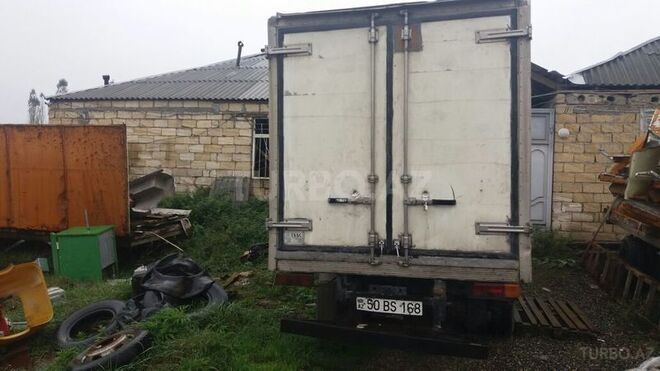 Isuzu NPR 66 P 1998, 300,000 km - 0.4 л - Bakı