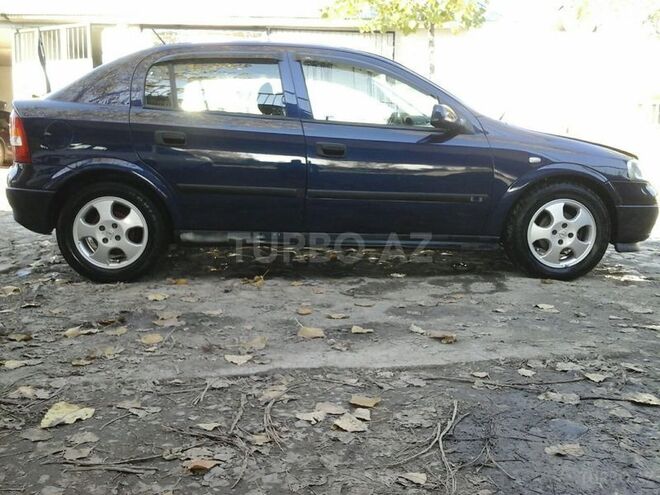 Opel Astra 1999, 141,000 km - 1.6 л - Qax