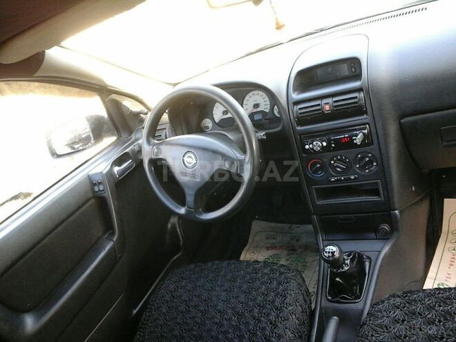 Opel Astra 1999, 141,000 km - 1.6 л - Qax