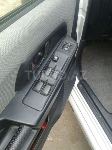 Mitsubishi Pajero io 1999, 180,000 km - 1.8 l - Bakı
