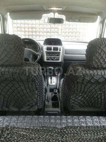 Mitsubishi Pajero io 1999, 180,000 km - 1.8 l - Bakı
