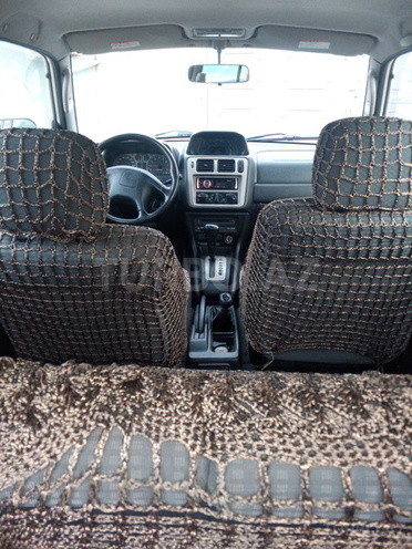 Mitsubishi Pajero io 1999, 23,000 km - 1.8 l - Bakı